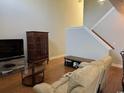 Cozy living room featuring a fireplace, comfortable seating, and ample natural light at 1060 Fairway Ln. # 1060, Conway, SC 29526