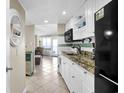Well-equipped kitchen featuring granite countertops and modern appliances at 2001 S Ocean Blvd. # 1506, Myrtle Beach, SC 29577