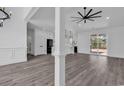 Spacious living room that opens to the kitchen and has hardwood floors at 1054 Englemann Oak Dr., Myrtle Beach, SC 29579