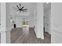 Bright living room with hardwood floors and a modern ceiling fan at 1054 Englemann Oak Dr., Myrtle Beach, SC 29579