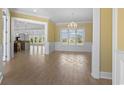 Bright dining room with hardwood floors and view to kitchen at 8030 Wacobee Dr., Myrtle Beach, SC 29579