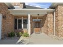 Inviting front entrance with brick facade and a double door at 8030 Wacobee Dr., Myrtle Beach, SC 29579