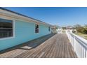 Large deck perfect for relaxing and enjoying the outdoors at 243 Calhoun Dr., Garden City Beach, SC 29576