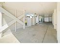 Spacious covered parking area under an elevated beach home at 302A 32Nd Ave. N, North Myrtle Beach, SC 29582