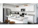 Modern kitchen with stainless steel appliances, granite counters, and white cabinetry at 109 Arrow Wood Dr, Conway, SC 29526