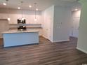 Open-concept kitchen featuring granite counters, stainless steel appliances, a large island, and pendant lighting at 110 Arrow Wood Dr, Conway, SC 29526