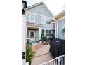 Outdoor space with grill, patio seating, and lush landscaping at 2256 Heritage Loop # 2256, Myrtle Beach, SC 29577