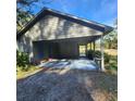 Covered carport attached to the house at 354 George Washington Trail, Georgetown, SC 29440