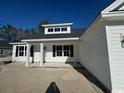 Front view of a charming new construction home with white siding at 4646 Quiet Ave., Conway, SC 29527