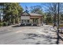 Community entrance gate for residents and guests at 100 Ocean Creek Dr. # L5, Myrtle Beach, SC 29572