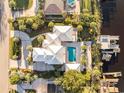 Aerial view of luxurious home with pool and private dock on the water at 3788 Waterford Dr., Myrtle Beach, SC 29577