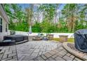 Relaxing patio with hot tub, fire pit, and seating area at 570 Flowering Branch Ave., Little River, SC 29566