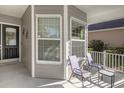 Inviting front porch with seating, offering a relaxing outdoor space at 138 Sugar Loaf Ln., Murrells Inlet, SC 29576