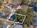 An overhead view showcasing the home's lush surroundings, yard, and convenient access at 538 Calhoun Dr., Murrells Inlet, SC 29576