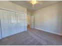 Clean bedroom with plush carpet, closet, and soft, natural light creating a serene space at 2770 Daisy Rd., Loris, SC 29569