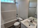 Clean bathroom with a shower-tub combo, a toilet, and a vanity with sink and mirror at 2814 Daisy Rd., Loris, SC 29569