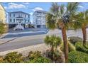 Coastal homes with multiple balconies and a glimpse of the beach at 4201 N Ocean Blvd. # 2M, North Myrtle Beach, SC 29582