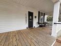 Spacious front porch with seating, perfect for relaxing and enjoying the outdoors at 306 E Godbold St., Marion, SC 29571