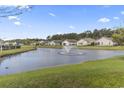 Scenic community pond view complete with water fountain and well-maintained landscaping at 1133 Spalding Ct., Surfside Beach, SC 29575