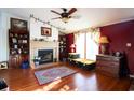 Living room features a fireplace and hardwood floors at 2780 Oak St., Conway, SC 29526
