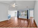 Bright and airy living room showcasing hardwood floors and a large window at 784 Riverward Dr., Myrtle Beach, SC 29588