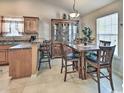 Cozy eat-in kitchen boasts a breakfast bar, modern appliances, ample cabinetry and adjacent dining space at 2707 Wood Creek Ln., Conway, SC 29527