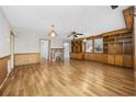 Bright living room with hardwood floors, built-in shelving, and a brick fireplace at 4502 Eyerly St., North Myrtle Beach, SC 29582