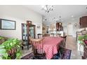 Comfortable dining room with traditional wooden table, chairs, and view into open concept living space at 1004 Millsite Dr., Conway, SC 29526