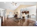 Bright and airy living room boasting vaulted ceilings, hardwood floors, and an open concept design at 1004 Millsite Dr., Conway, SC 29526