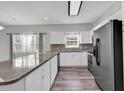 Modern kitchen with granite countertops and stainless steel appliances at 3943 Gladiola Ct. # 204, Myrtle Beach, SC 29588