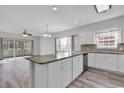 Modern kitchen with granite countertops and stainless steel appliances at 3943 Gladiola Ct. # 204, Myrtle Beach, SC 29588