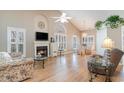 Spacious living room featuring a fireplace and hardwood floors at 422 Nature Trail Dr., Little River, SC 29566