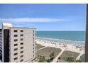 Gorgeous ocean view from condo overlooks sandy beach and sparkling coastline at 603 S Ocean Blvd. # 1002, North Myrtle Beach, SC 29582