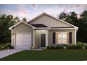 Inviting single-story home featuring a one-car garage, well-manicured lawn, and charming landscape lighting at 1016 Sw Maple View Rd., Supply, SC 28462