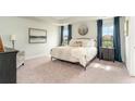 Serene main bedroom with plush carpet, soft lighting, and elegant furnishings at 531 Slaty Dr., Myrtle Beach, SC 29588
