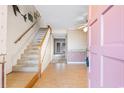 Entryway with pink door and view into living area at 305 21St Ave. S # 108, Myrtle Beach, SC 29577
