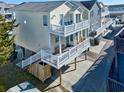 Inviting stilt home with dual balconies, offering stunning elevated views and coastal charm at 6001 - 1045 S Kings Hwy., Myrtle Beach, SC 29575