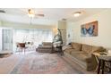 Living room with couch, chair, and area rug at 1204 Erin Way # 1204-F, Myrtle Beach, SC 29577