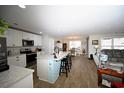 Modern kitchen with stainless steel appliances and an island at 865 Freestyle Ct., Longs, SC 29568