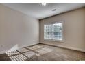 Bright bedroom with large window and neutral carpeting at 100 Barons Bluff Dr., Conway, SC 29526