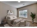 Virtually staged bedroom with a queen-size bed and neutral decor at 100 Barons Bluff Dr., Conway, SC 29526