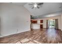 Open living area with hardwood floors and a view of the kitchen at 100 Barons Bluff Dr., Conway, SC 29526