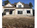 New home construction featuring a covered porch and large sliding glass doors at 1020 Clamour Ct., Conway, SC 29526