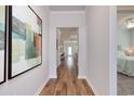 Inviting hallway with hardwood floors leading to the bedrooms and living area at 134 Hancher Dr., Myrtle Beach, SC 29588