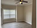 Bright bedroom with hardwood floors and window blinds at 2013 Silvercrest Dr. # 30-A, Myrtle Beach, SC 29579