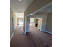 Open living room with high ceilings and views into the kitchen at Tbd 18 Casey Dr., Nichols, SC 29581