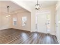Bright and spacious foyer with wood-look flooring at 101 Bantry Ln., Conway, SC 29526