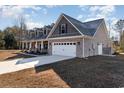 Side view of house highlighting garage and landscaping at 101 Bantry Ln., Conway, SC 29526