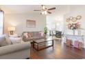 Bright living room featuring modern decor, hardwood floors, and an open floor plan at 1049 Augustus Dr., Conway, SC 29527