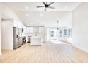 Open concept kitchen with stainless steel appliances and island at 2409 Causey Dr., North Myrtle Beach, SC 29582